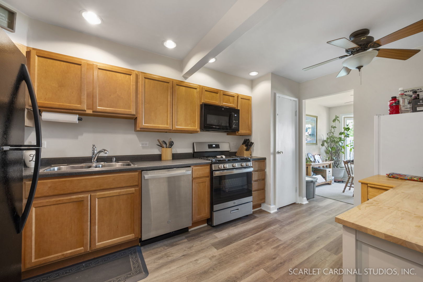 162 Tracy Way Bolingbrook, IL 60440 - Photo 5 of 11 a kitchen with stainless steel appliances granite countertop a stove a sink and a refrigerator