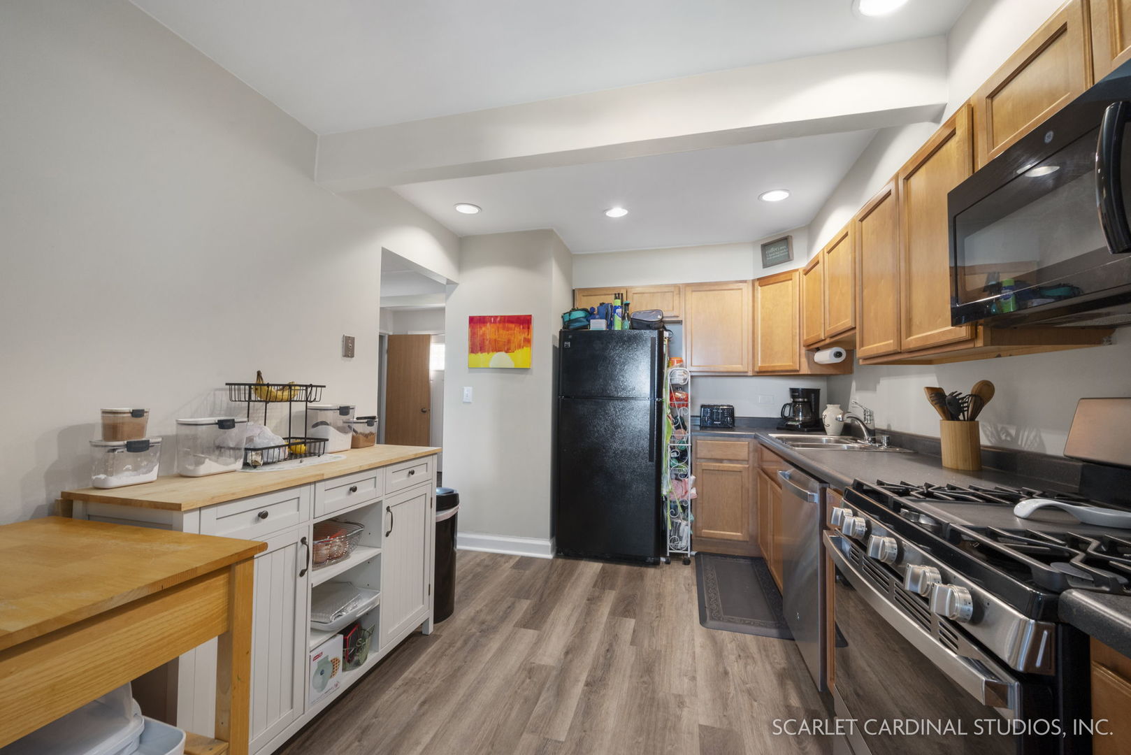 162 Tracy Way Bolingbrook, IL 60440 - Photo 6 of 11 a kitchen with a stove a sink and a refrigerator