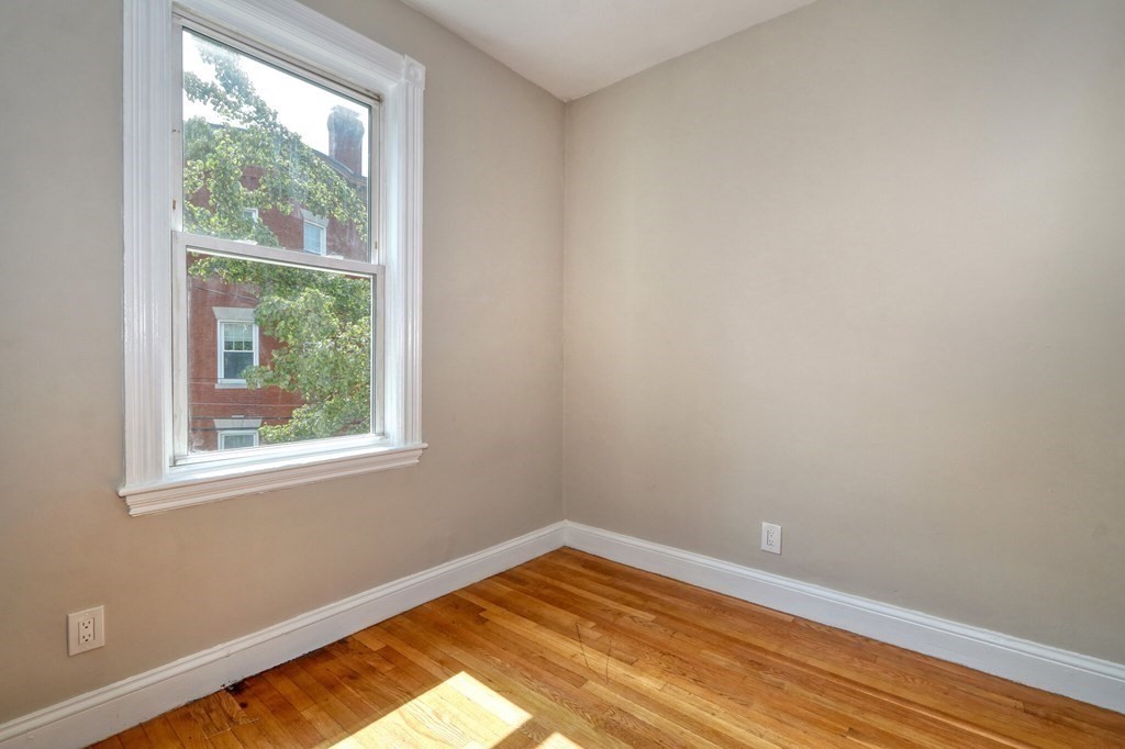 15-17 Pond Street Boston, MA 02130 - Photo 7 of 21 a view of an empty room and window