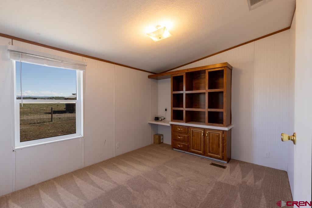 10662 Highway 172 Ignacio, CO 81137 - Photo 25 of 30 an empty room with windows