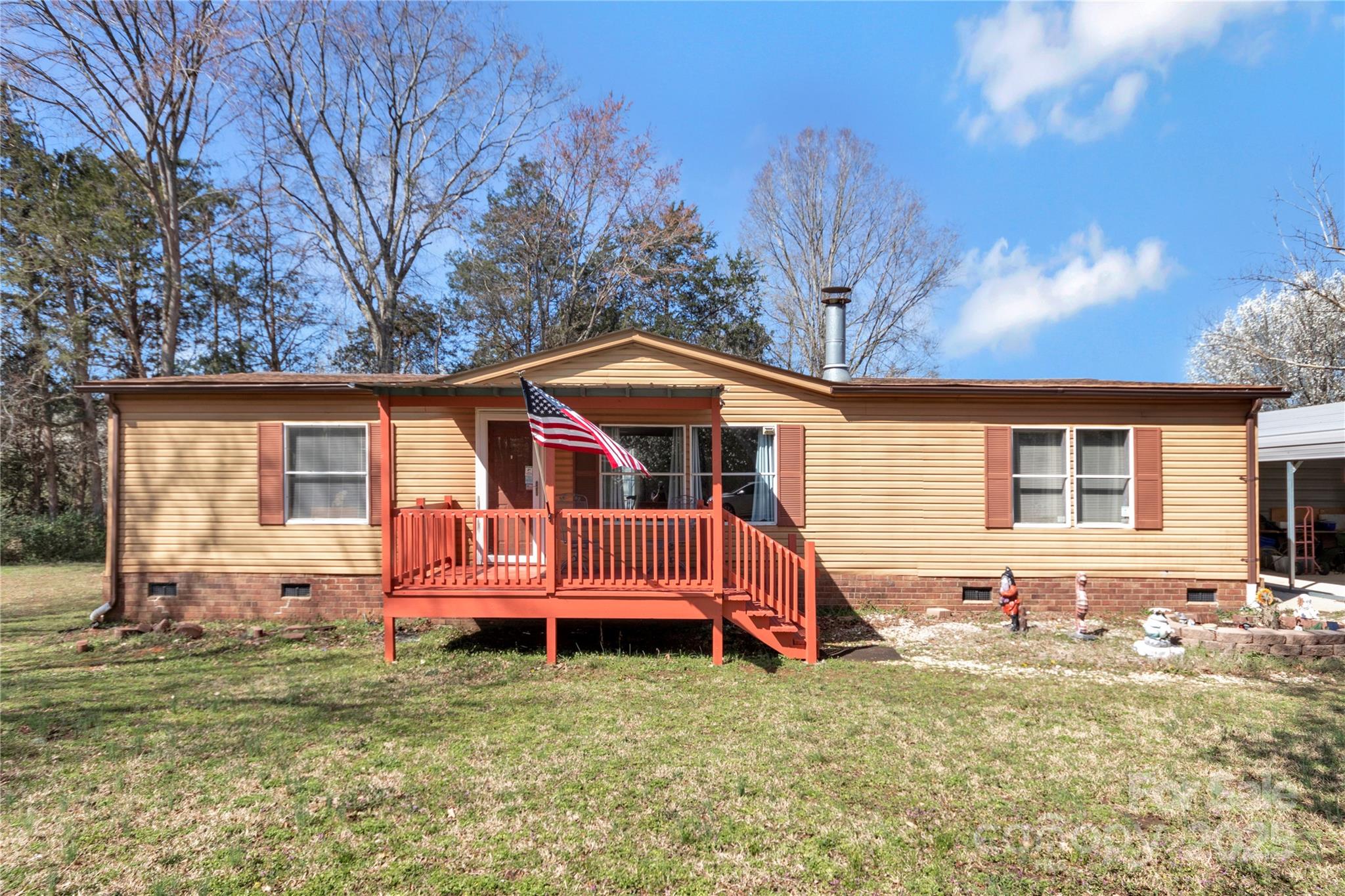 3080 Sims Road Rock Hill, SC 29730 - Photo 1 of 25 a front view of a house with garden