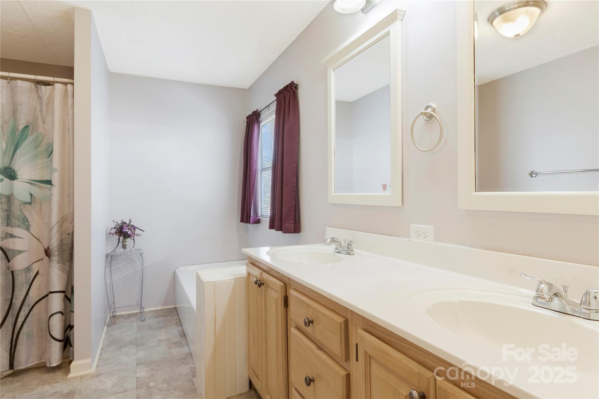 3080 Sims Road Rock Hill, SC 29730 - Photo 14 of 25 a bathroom with a sink and a mirror