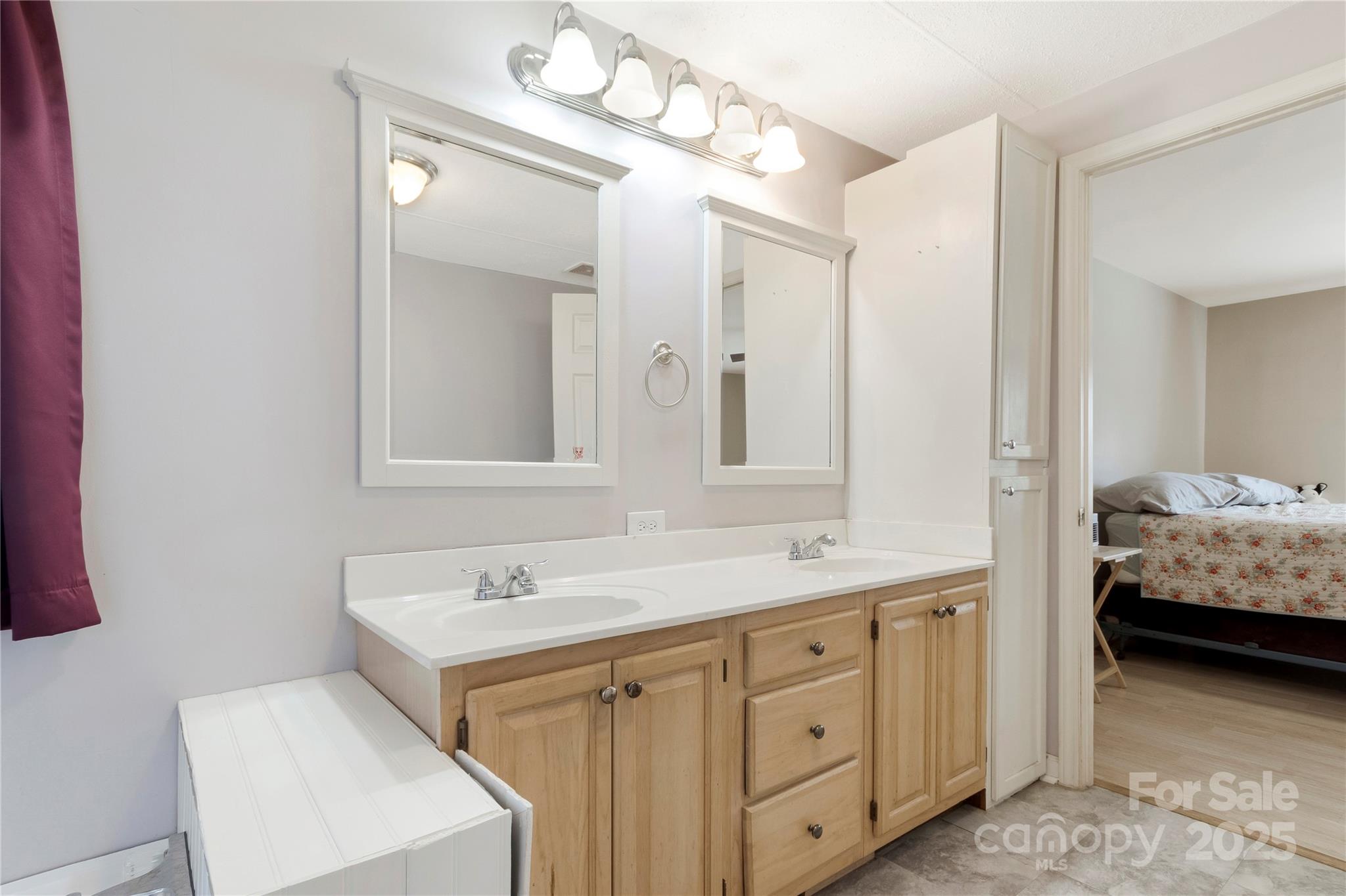 3080 Sims Road Rock Hill, SC 29730 - Photo 15 of 25 a en suite bathroom with double sink and a mirror
