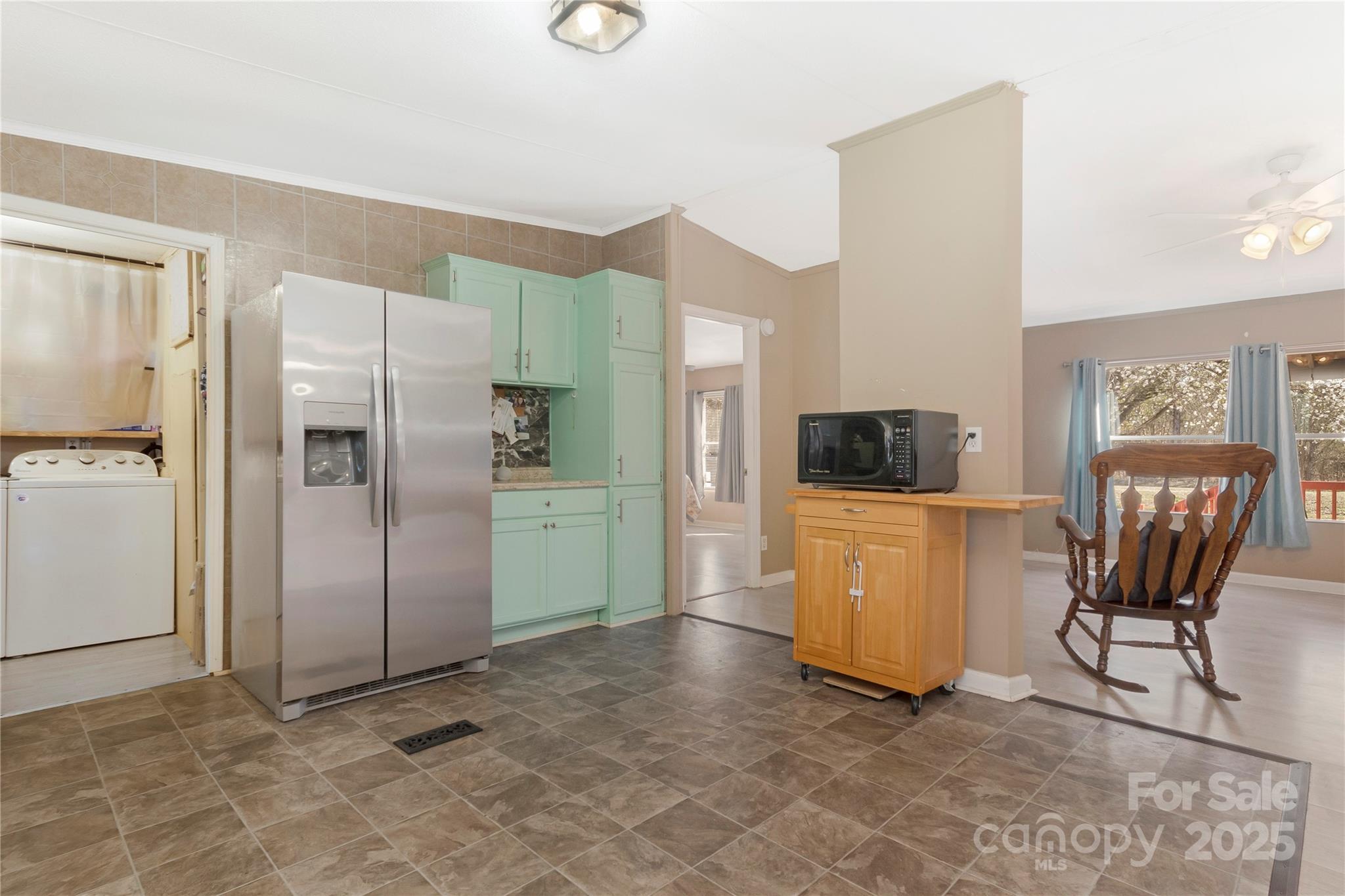 3080 Sims Road Rock Hill, SC 29730 - Photo 7 of 25 a view of a kitchen with refrigerator and workspace