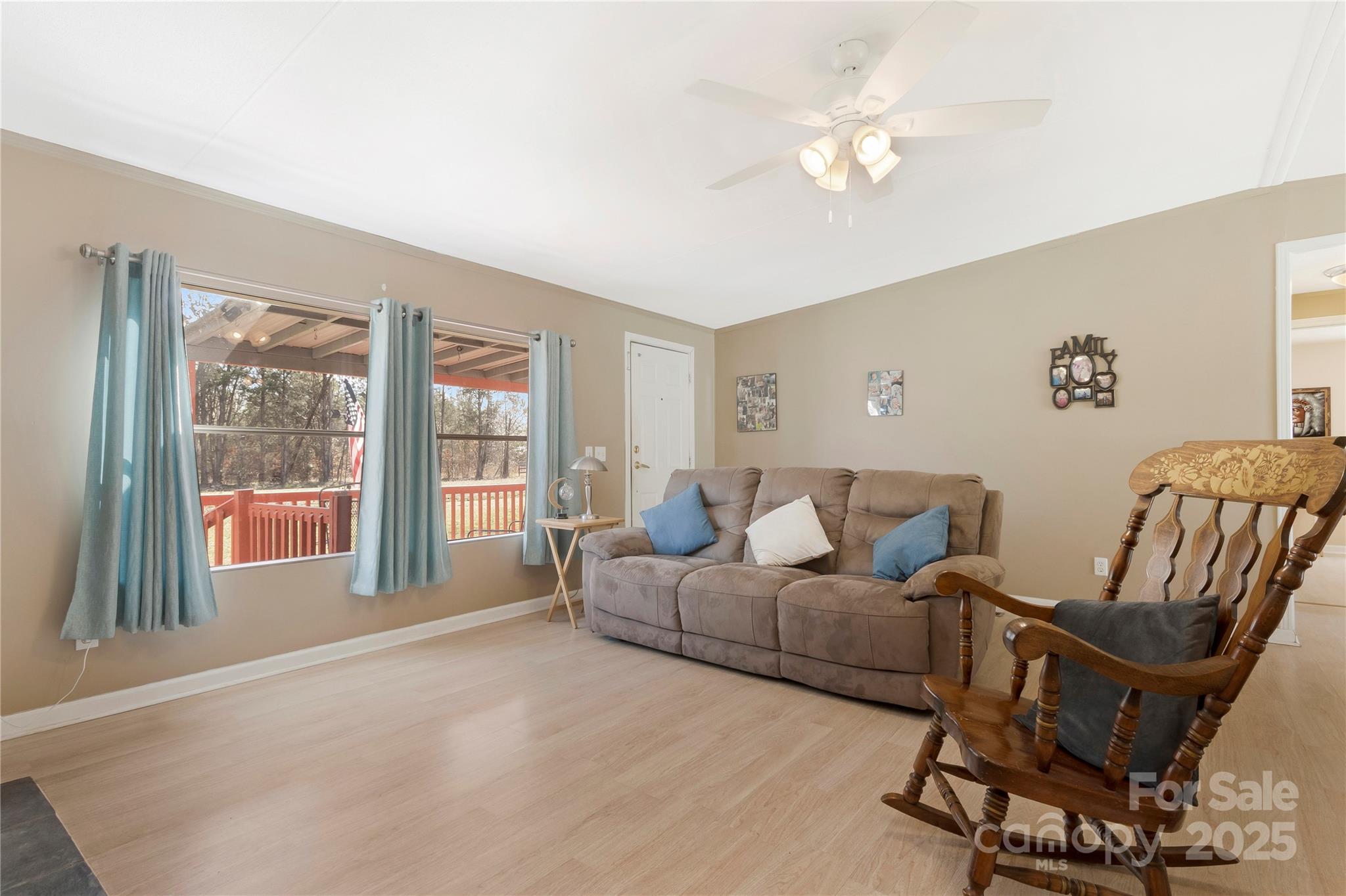 3080 Sims Road Rock Hill, SC 29730 - Photo 9 of 25 a living room with furniture and a large window
