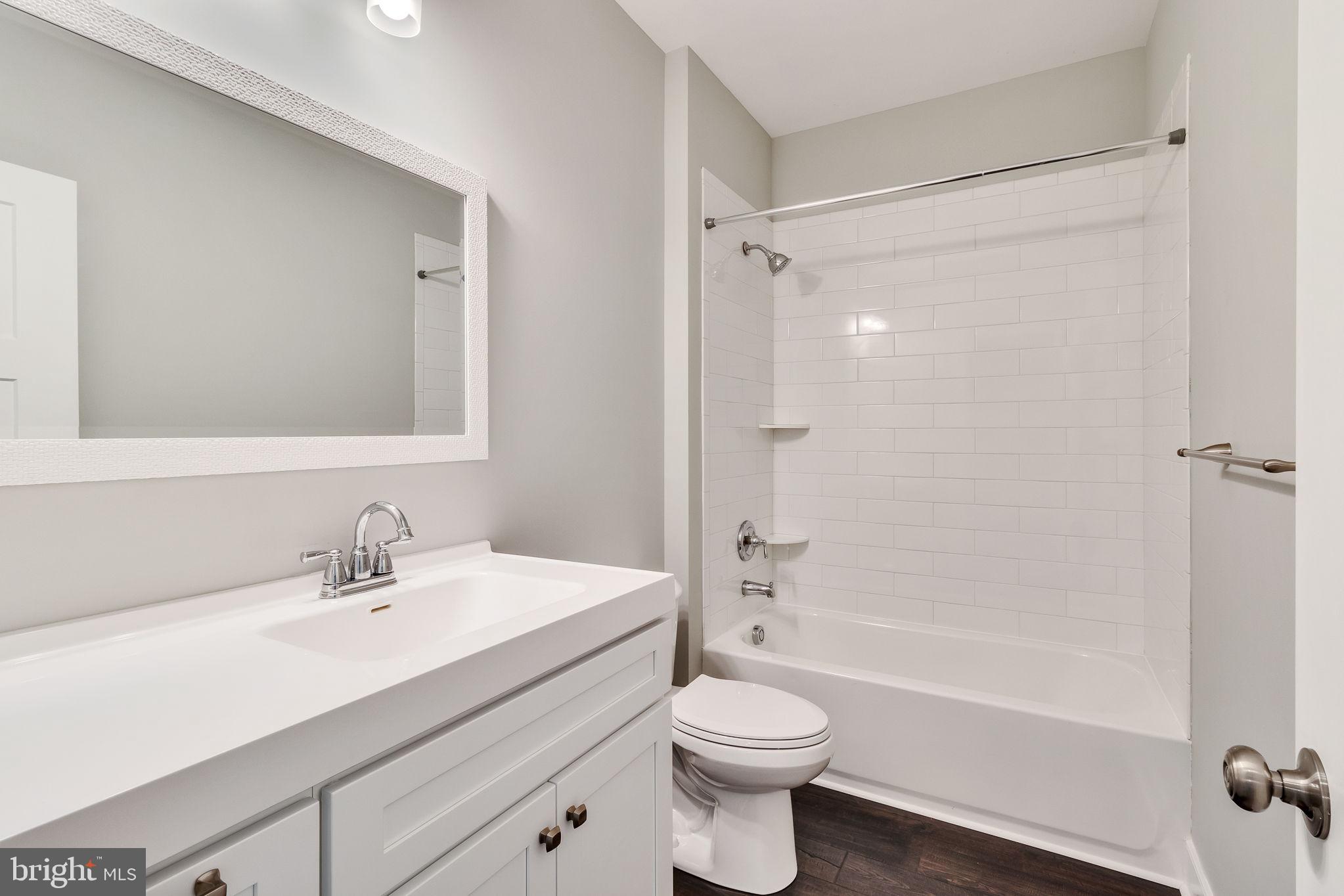57 Waterman's Way Reedville, VA 22539 - Photo 9 of 43 Second of two hall full baths, vanity with drawers