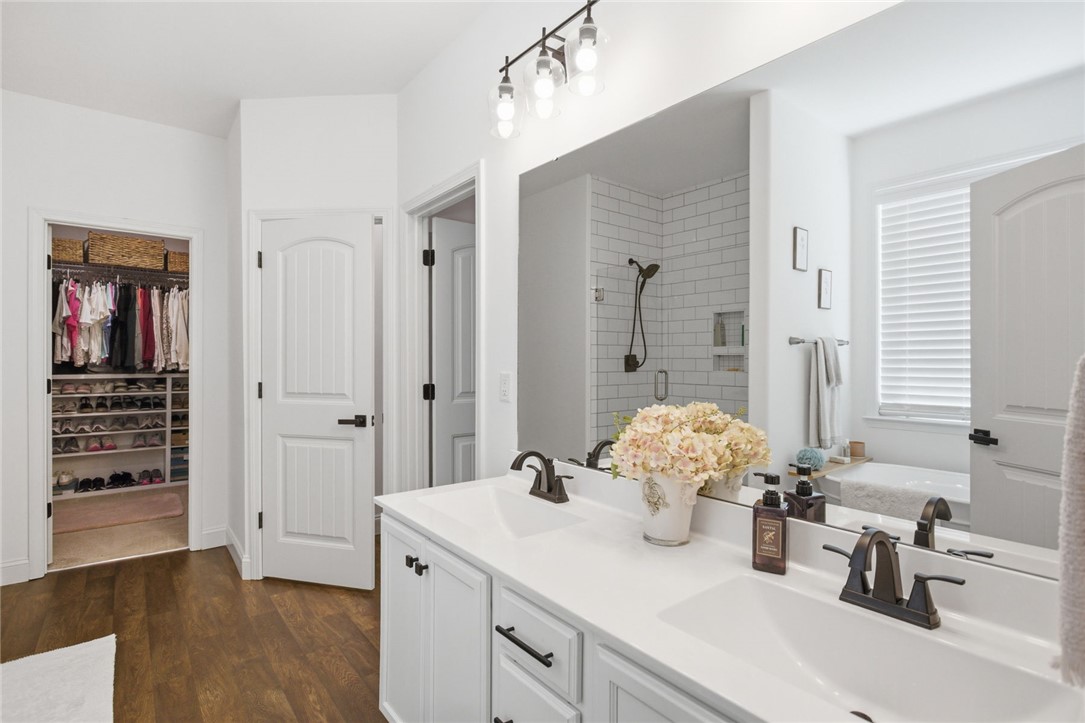525 16th Circle Walhalla, SC 29691 - Photo 42 of 50 This spacious primary bathroom features a dual vanity and an expansive walk-in closet.