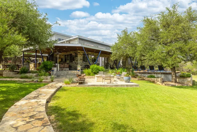 a view of a swimming pool with a patio