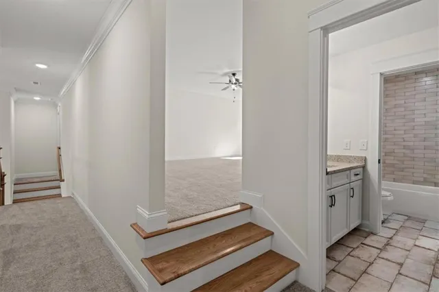 wooden floor with white walls