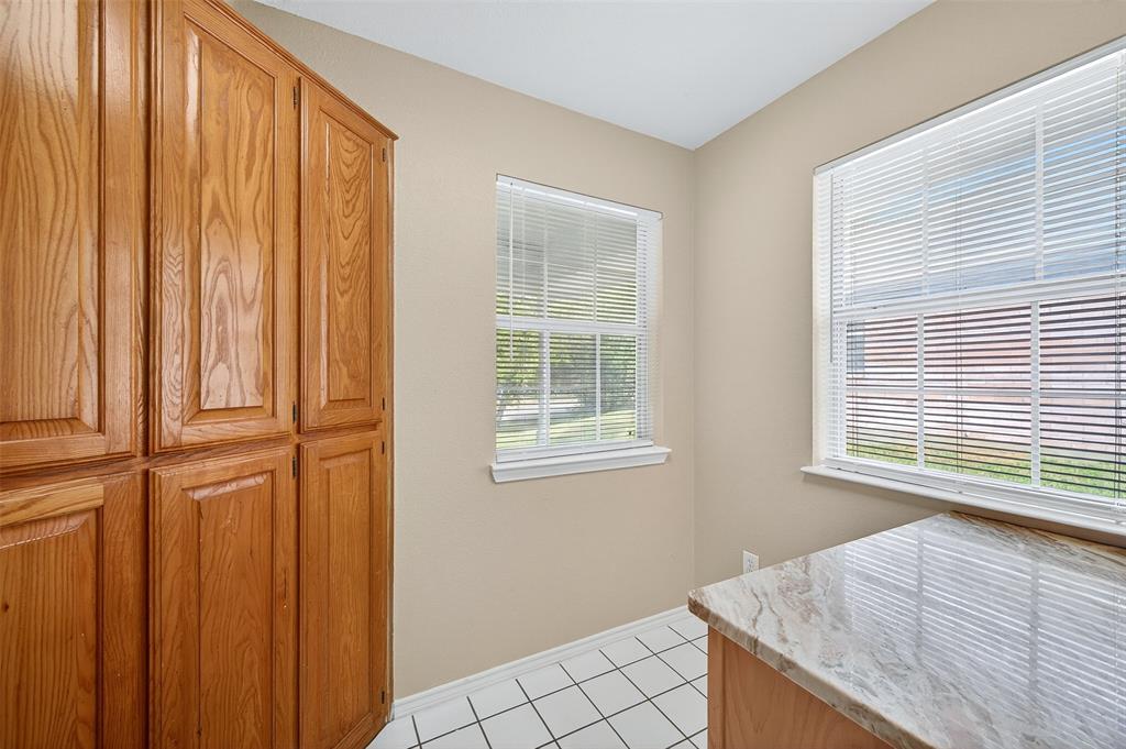 1813 Park Place Sherman, TX 75092 - Photo 11 of 23 a view of an empty room with a window