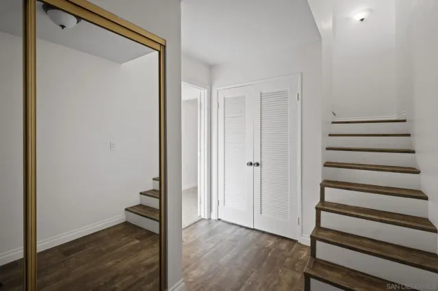 a view of entryway with wooden floor