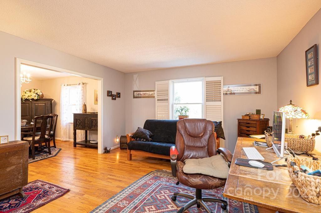 1761 4th St Circle Northeast Hickory, NC 28601 - Photo 18 of 48 a living room with furniture or couch and a wooden floor