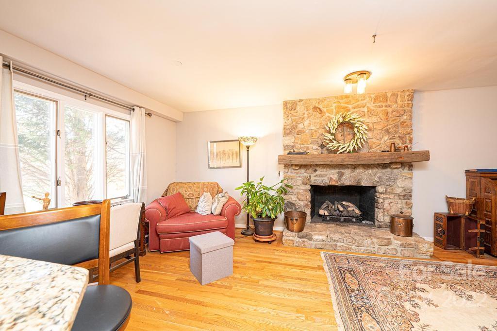1761 4th St Circle Northeast Hickory, NC 28601 - Photo 29 of 48 a living room with furniture and a fireplace