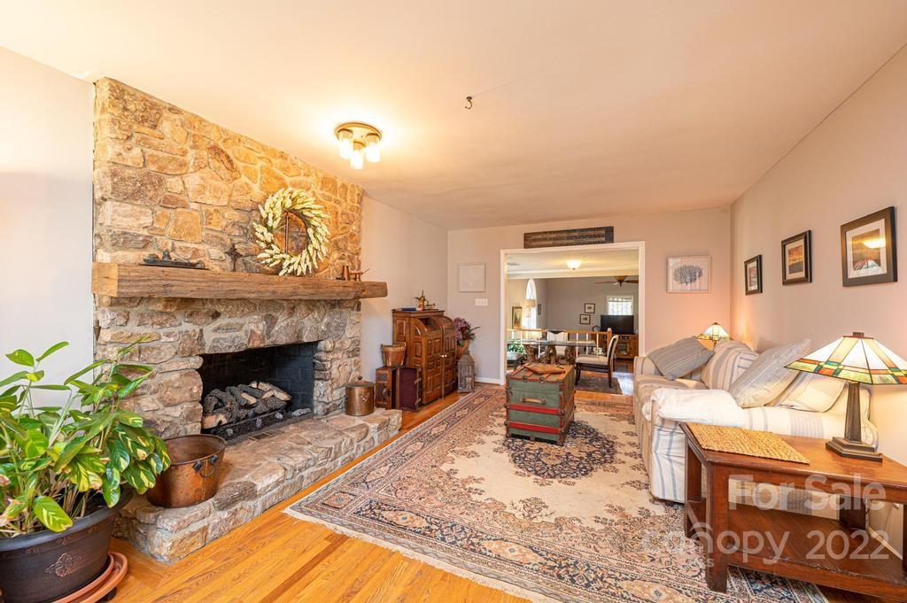 1761 4th St Circle Northeast Hickory, NC 28601 - Photo 30 of 48 a living room with furniture and a fireplace