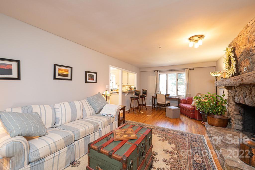 1761 4th St Circle Northeast Hickory, NC 28601 - Photo 31 of 48 a living room with furniture potted plant and a window