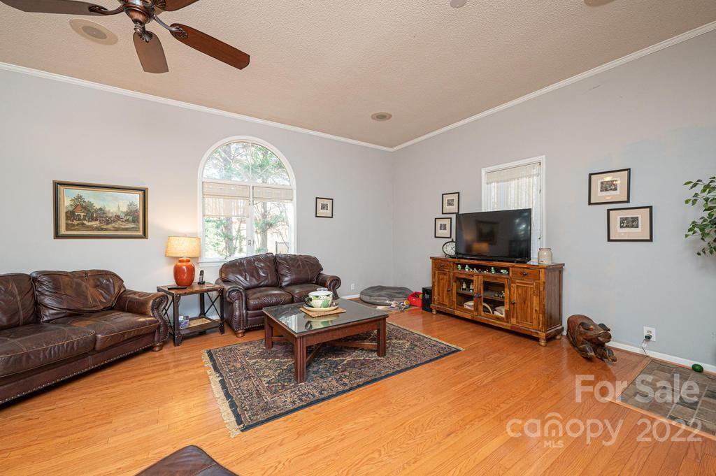 1761 4th St Circle Northeast Hickory, NC 28601 - Photo 36 of 48 a living room with furniture and a flat screen tv
