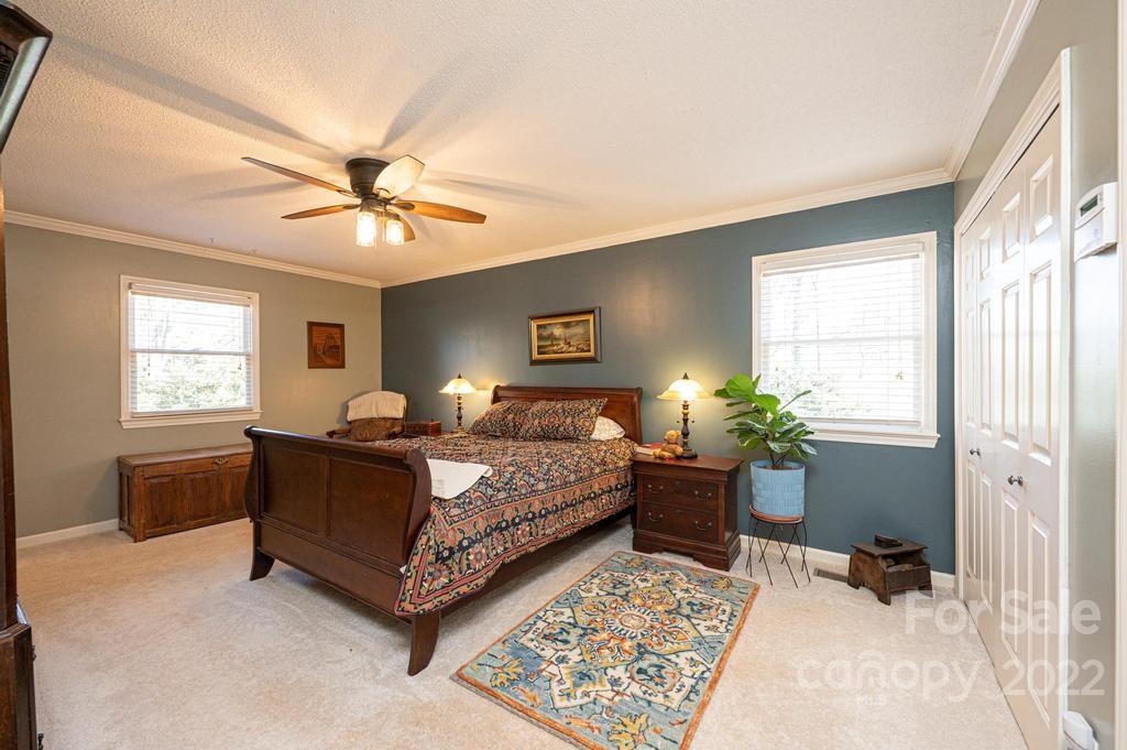 1761 4th St Circle Northeast Hickory, NC 28601 - Photo 42 of 48 a bed room with a bed and a window