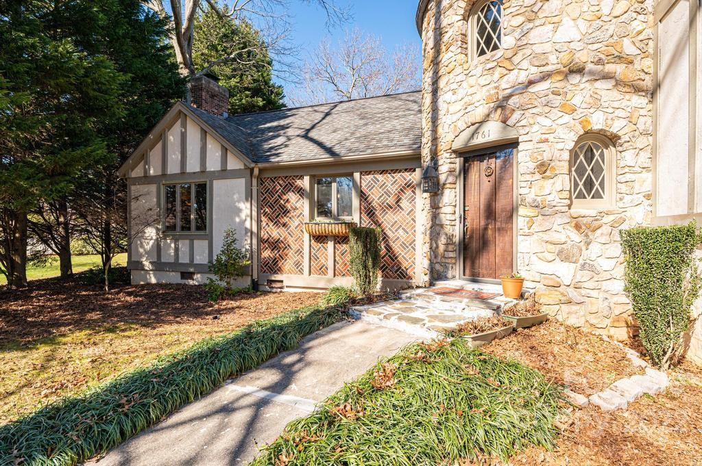 1761 4th St Circle Northeast Hickory, NC 28601 - Photo 5 of 48 a front view of a house with a yard and garage