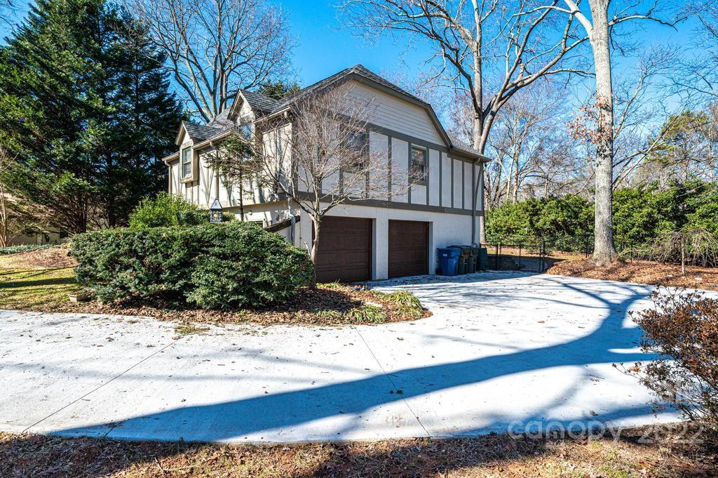 1761 4th St Circle Northeast Hickory, NC 28601 - Photo 7 of 48 a view of a house with snow on the road