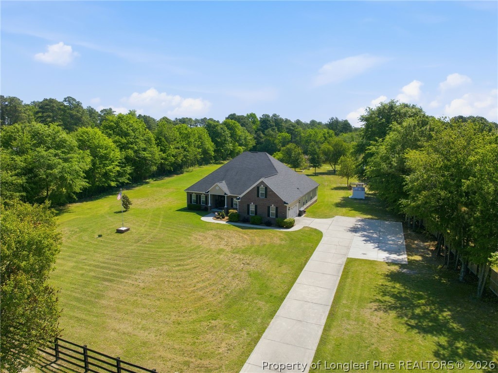 2589 June Johnson Road Raeford, NC 28376 - Photo 46 of 49 a view of swimming pool with garden