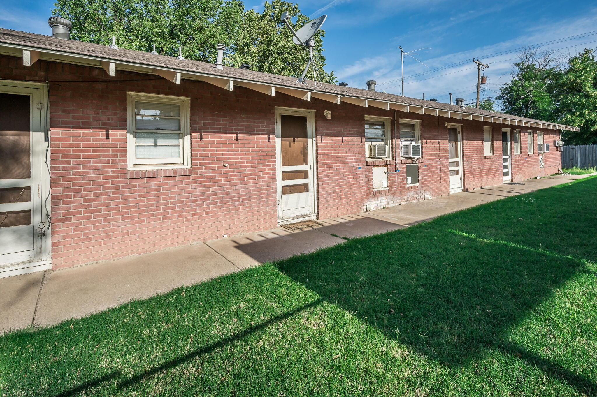 609 16th Street, Unit 3 Canyon, TX 79015 - Photo 14 of 15 a view of a back yard of the house
