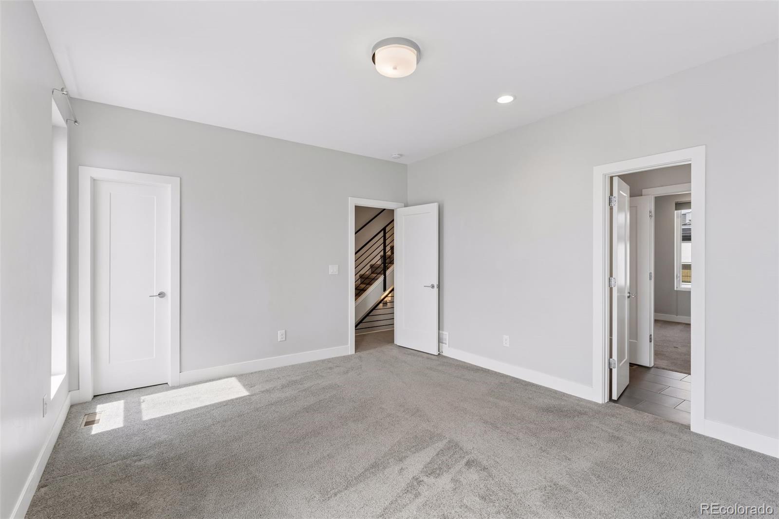 1235 Perry Street Denver, CO 80204 - Photo 30 of 41 a view of an empty room with a window
