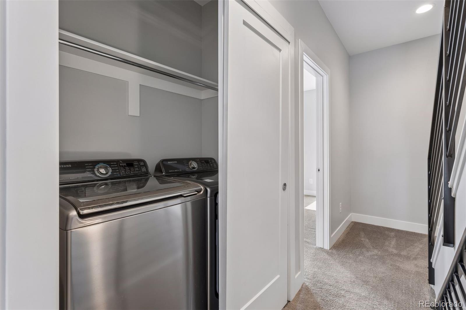 1235 Perry Street Denver, CO 80204 - Photo 31 of 41 a view of a storage & utility room with washer and dryer