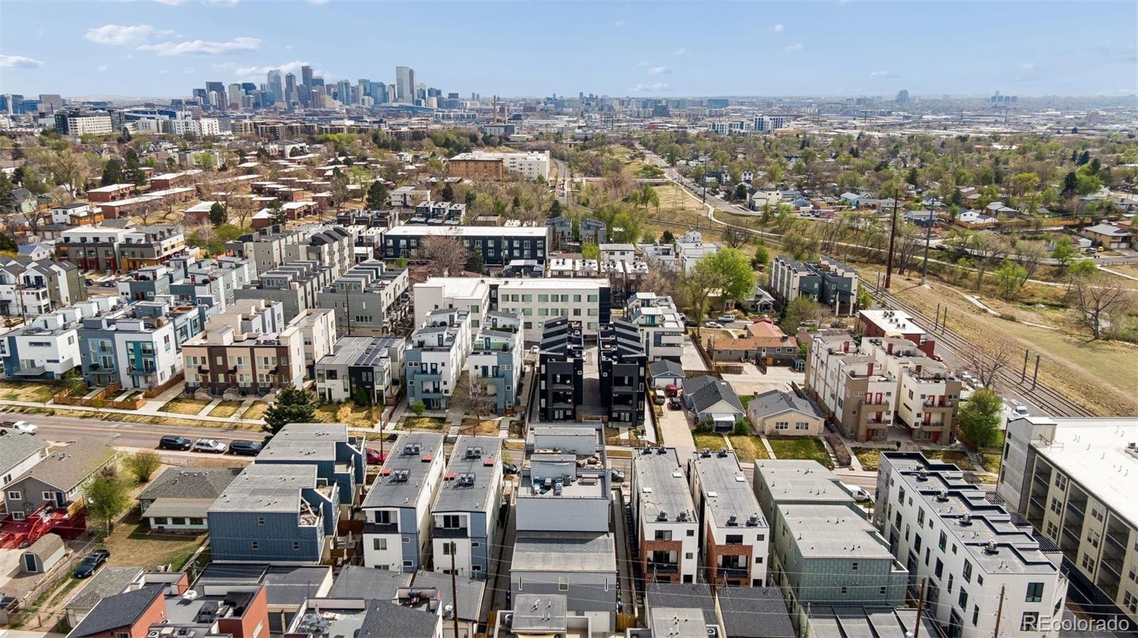 1235 Perry Street Denver, CO 80204 - Photo 40 of 41 an aerial view of a city with lots of residential buildings