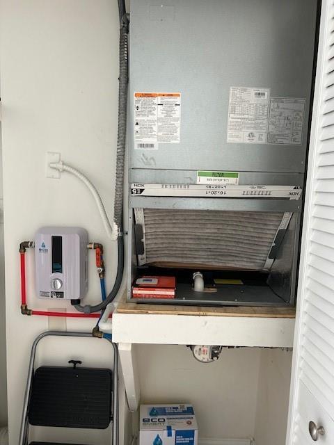 3590 Blue Lake Drive, Unit 305 Pompano Beach, FL 33064 - Photo 18 of 23 a view of utility room