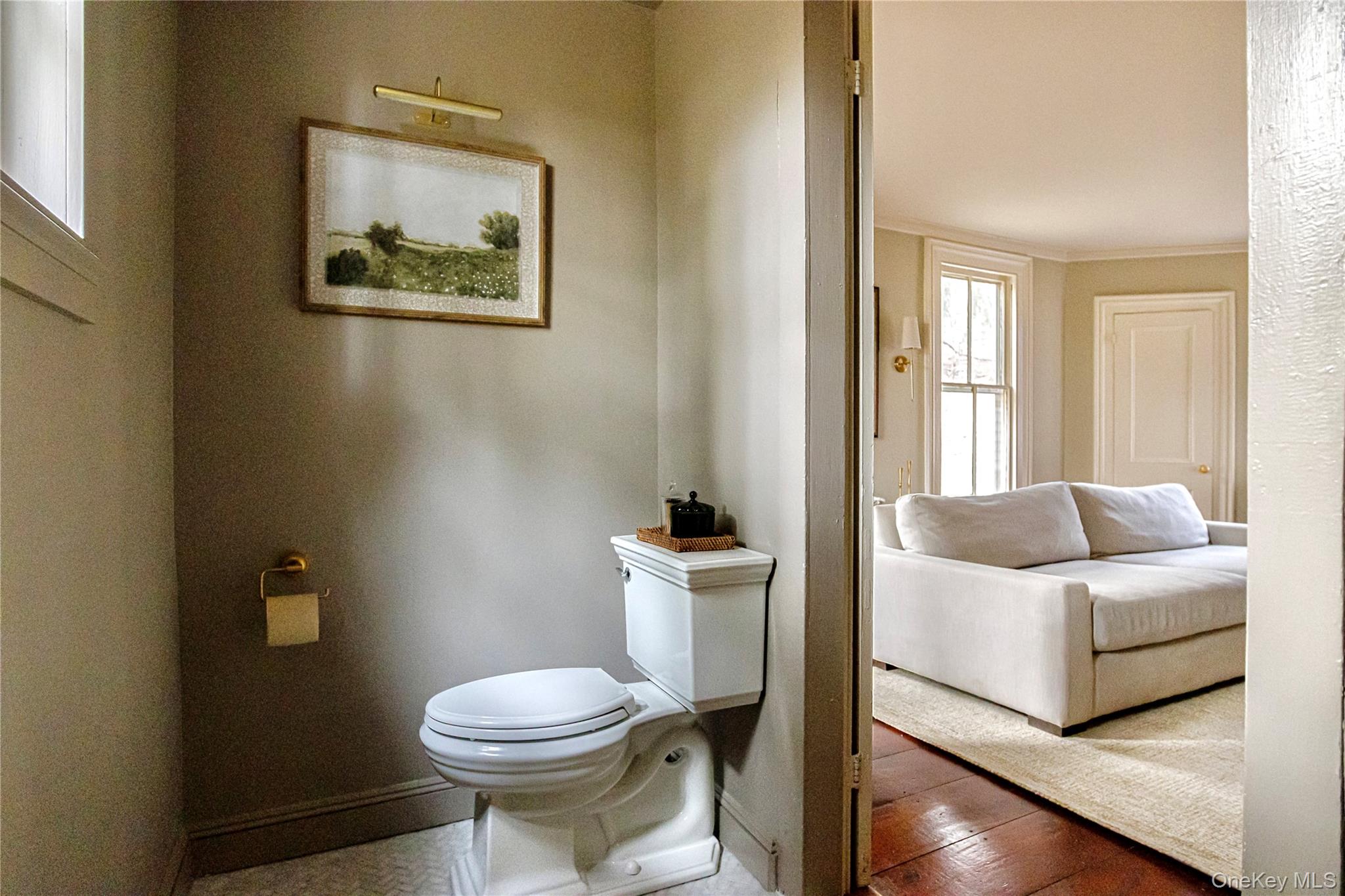 5091 Rte 9W Newburgh, NY 12550 - Photo 26 of 46 a bathroom with a toilet a sink and a mirror