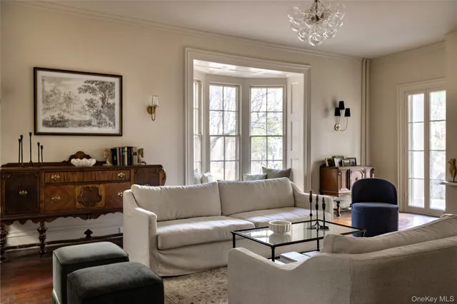 a living room with furniture or couch and a window