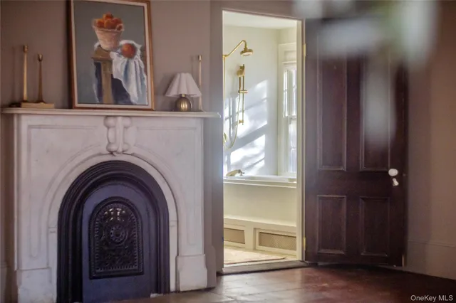 a view of a livingroom with a large mirror