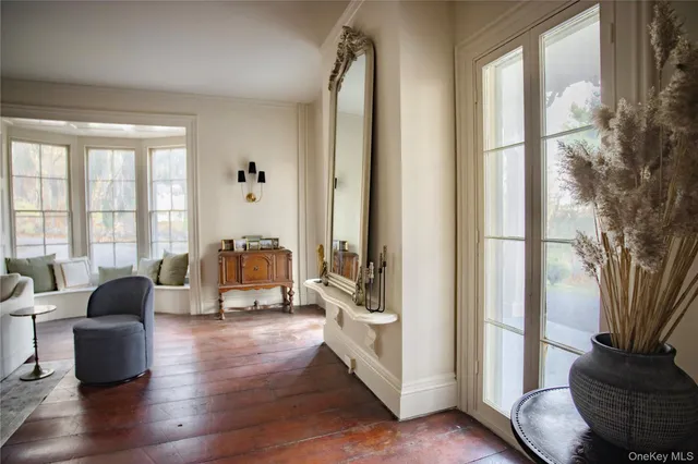 a living room with furniture and a gate