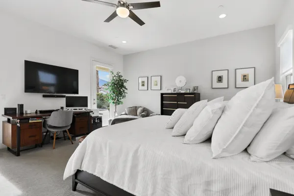 a room with furniture and a large window