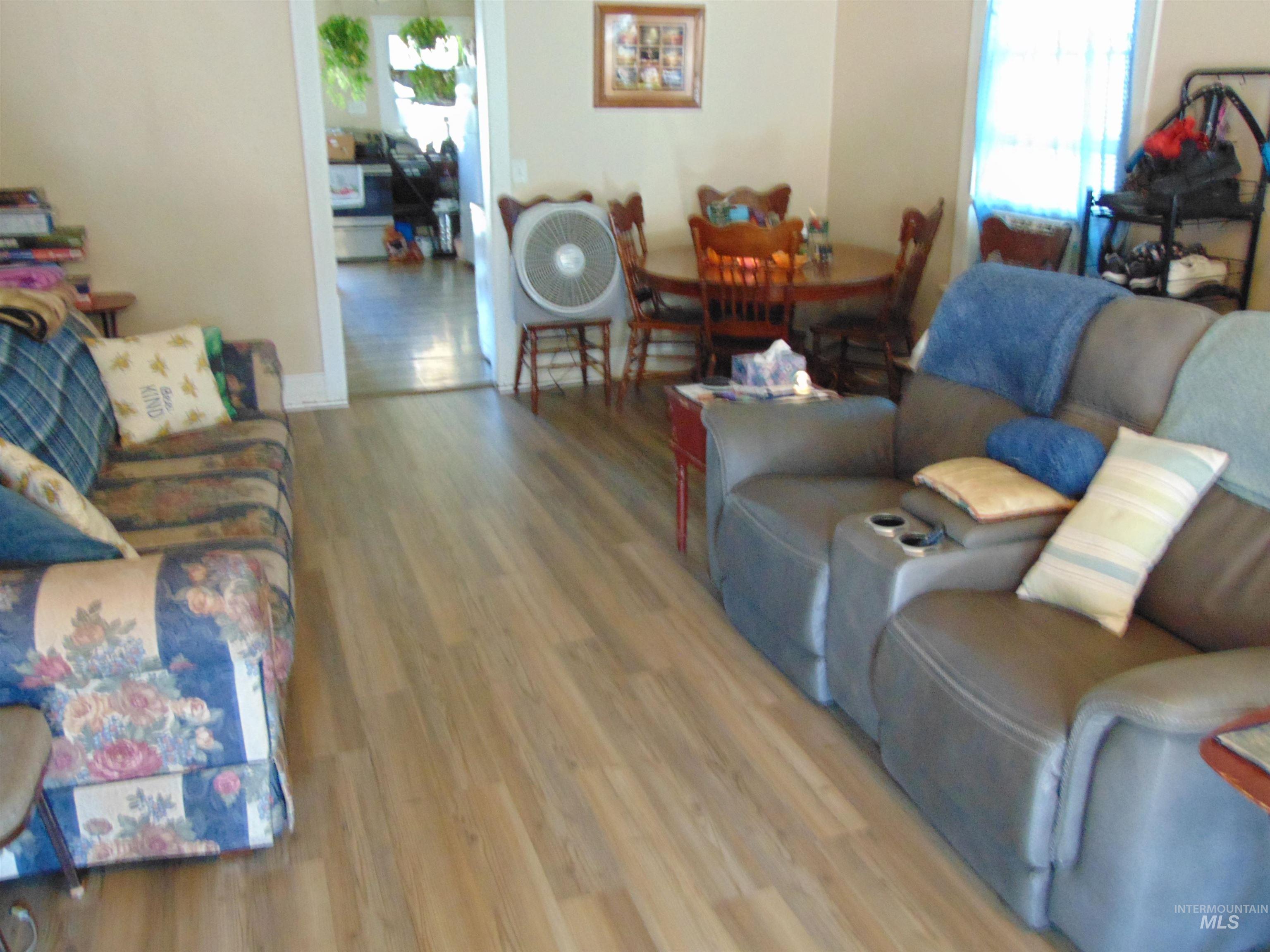 1437 Idaho Street Lewiston, ID 83501 - Photo 3 of 14 Living room featuring wood finished floors