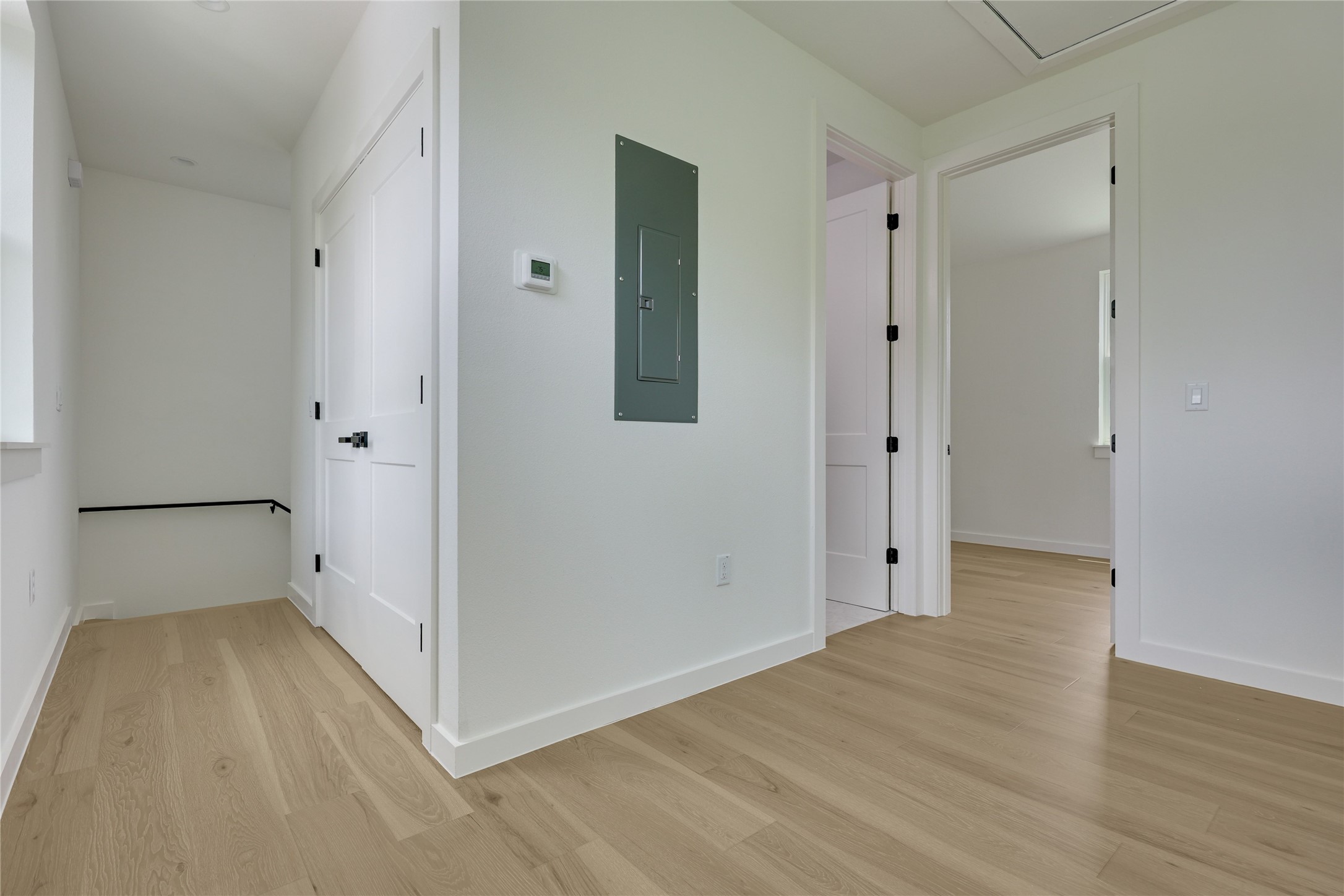 6809 Porter Street, Unit 2 Austin, TX 78741 - Photo 24 of 37 Upstairs hallway leading to bedrooms. Bonus loft space for study/office