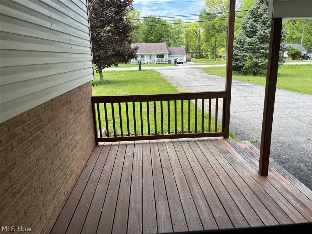 8785 Root Road North Ridgeville, OH 44039 - Photo 14 of 22 Wood Deck front porch