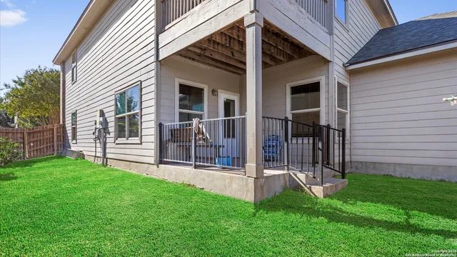 a view of a backyard with a small cabin