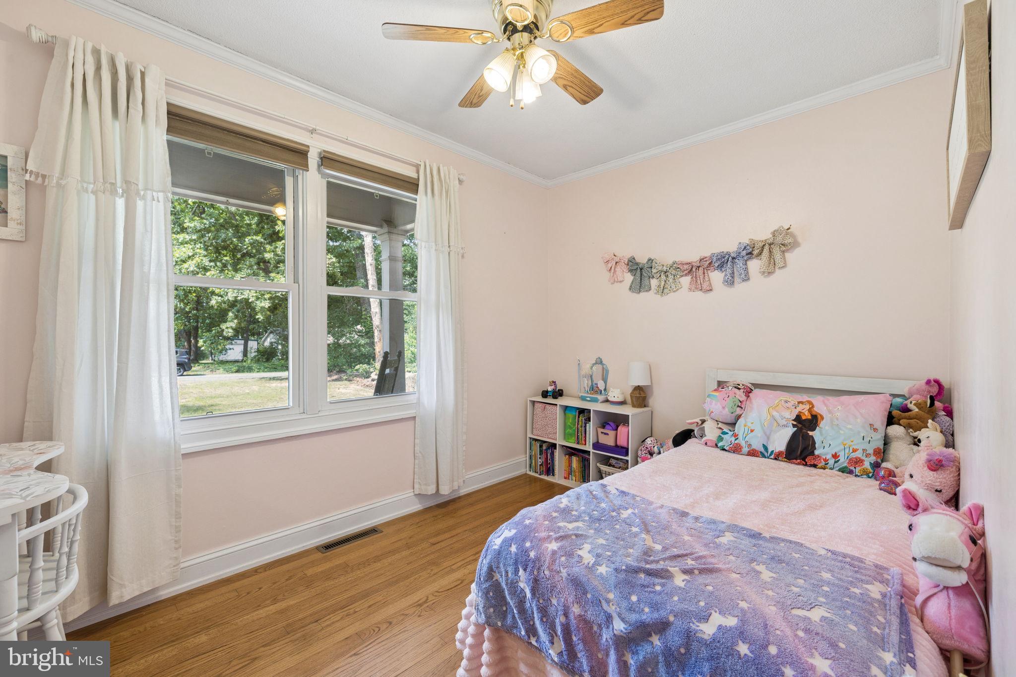 12237 Randle Lane Culpeper, VA 22701 - Photo 16 of 31 a bedroom with a bed and a window