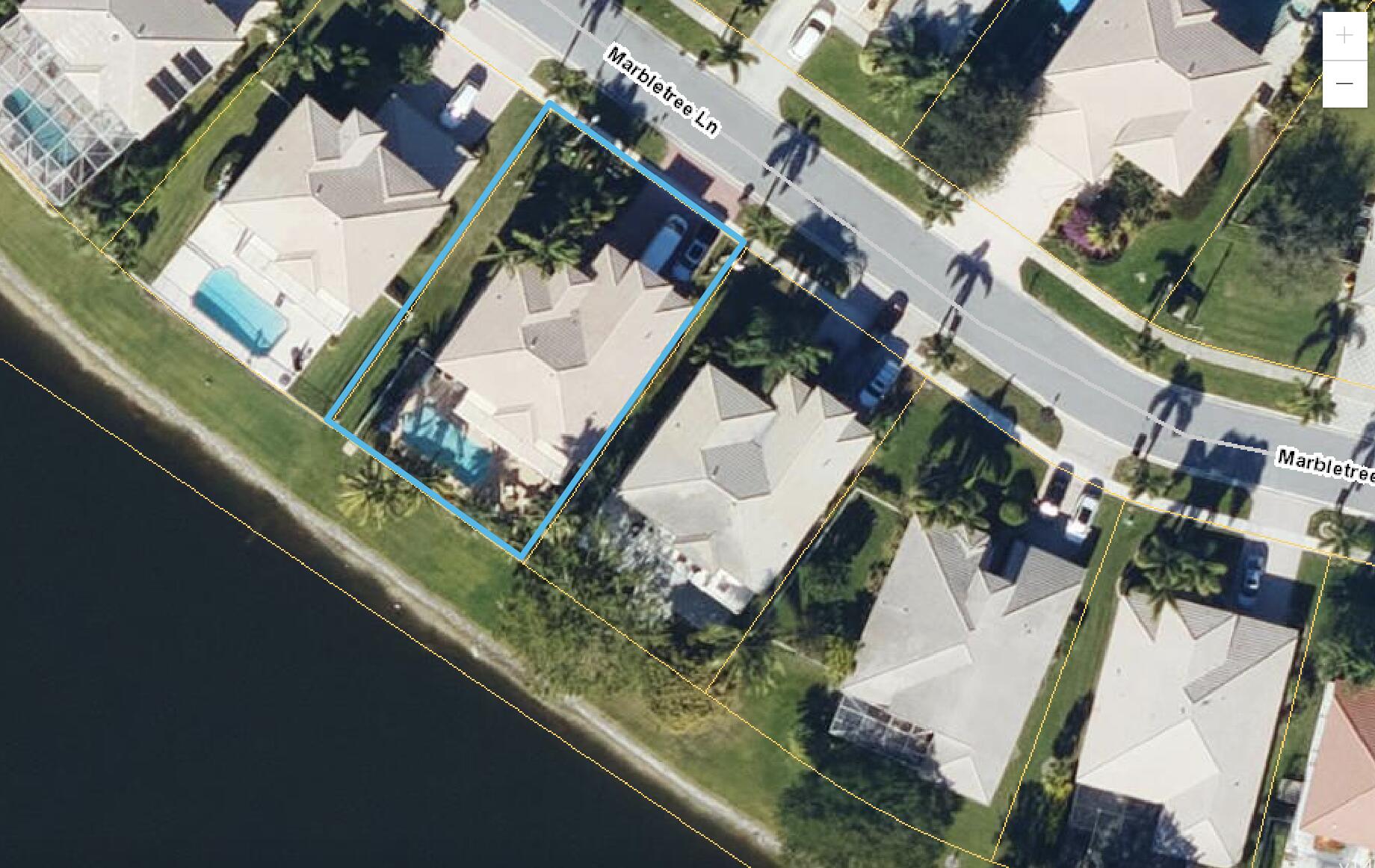 Undisclosed Address Lake Worth, FL 33467 - Photo 2 of 9 an aerial view of a house with a yard
