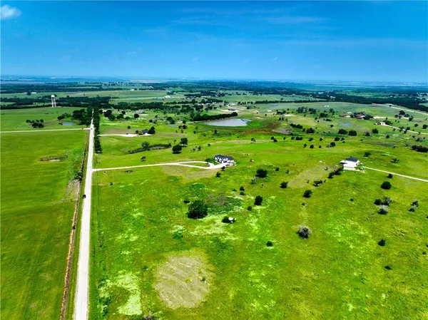 a view of a lush green field