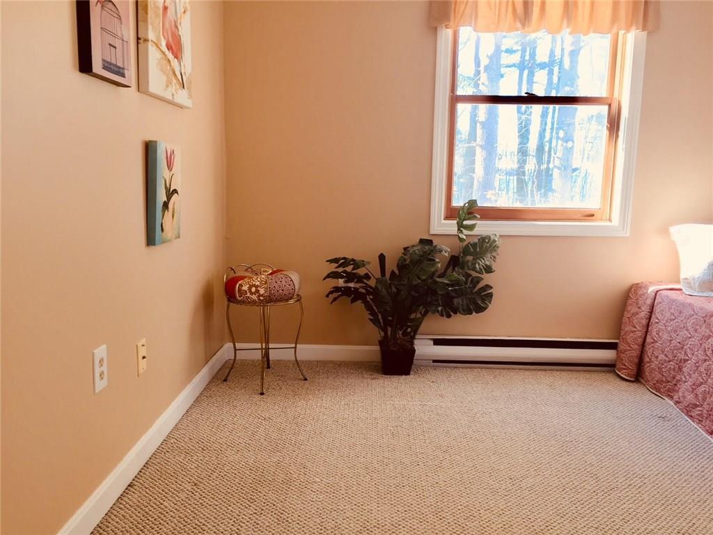 34 Ocean Park Road, Unit 37 Saco, ME 04072 - Photo 22 of 27 Spacious master bedroom