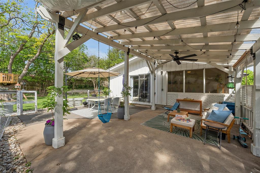 2216 Hermanson Drive Waco, TX 76710 - Photo 28 of 39 a view of a patio with a dining table and chairs