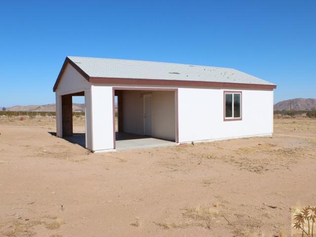 56579 Cubero Road Landers, CA 92285 - Photo 11 of 13 a view of an empty room with a house