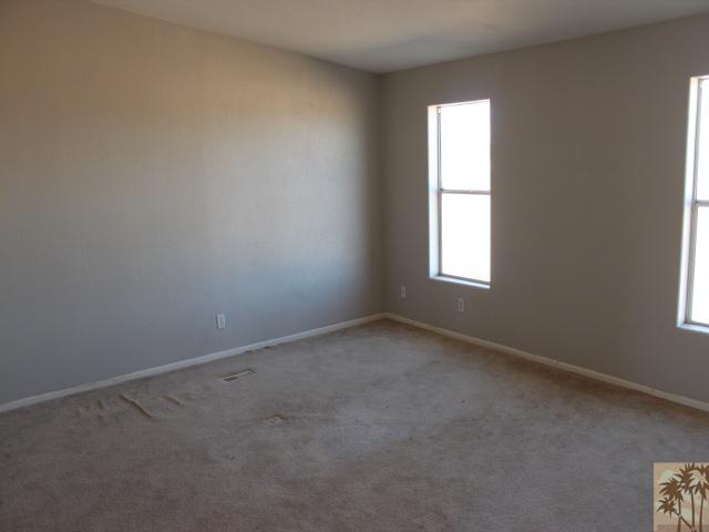 56579 Cubero Road Landers, CA 92285 - Photo 7 of 13 an empty room with a window