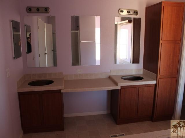 56579 Cubero Road Landers, CA 92285 - Photo 8 of 13 a kitchen with a sink a refrigerator and window