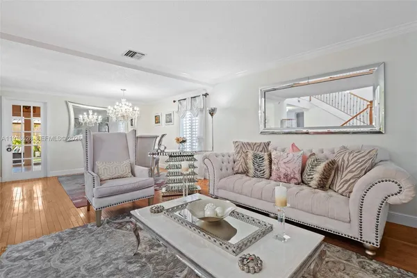 a living room with furniture and a couch