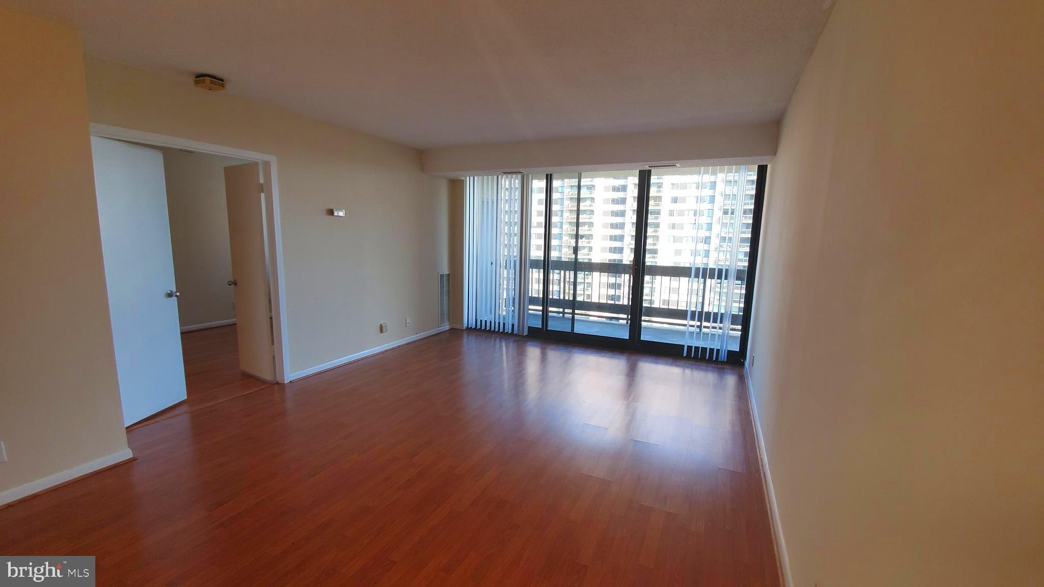 5505 Seminary Road, Unit 1418N Falls Church, VA 22041 - Photo 14 of 35 Living Room and a Door to the Bedroom