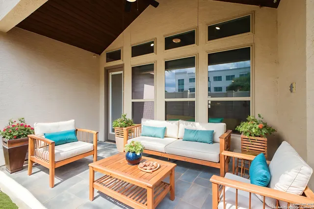 a outdoor living space with furniture and a potted plant