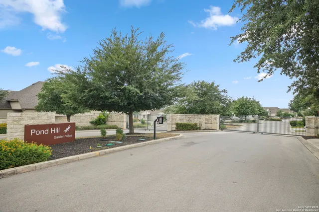 a view of a road with a building in the background